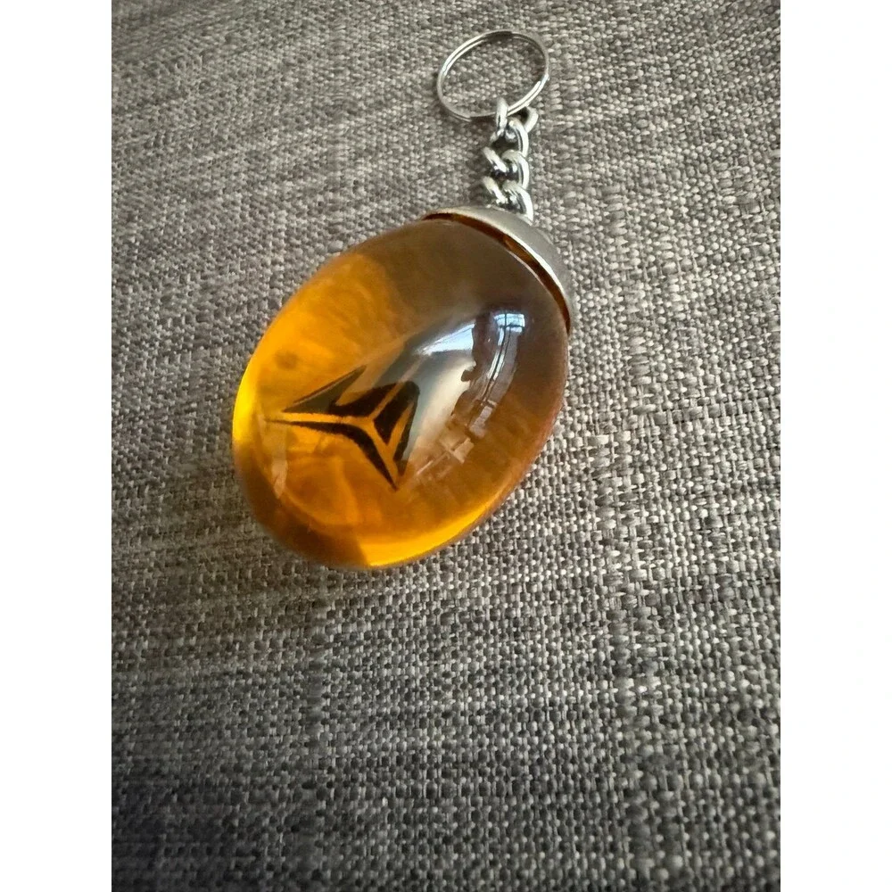 Jurassic park JA 3 Nike Keychain Amber Keychain Pendant
